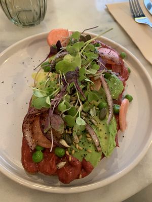 Avocado and hummus on toast  at Ringo Banana  in Sevilla