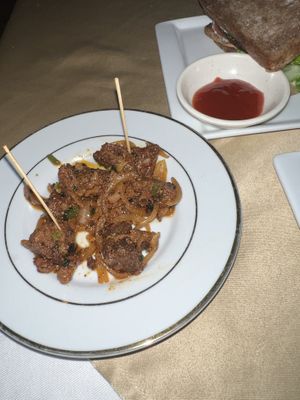 free seitan snack  at The White Lotus Cafe in Kathmandu