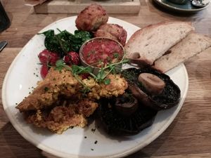 Plant based breakfast with hash browns (top of plate) at Moksha in Brighton
