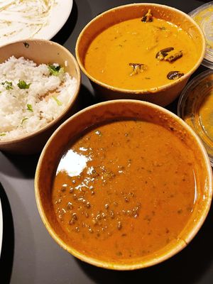 Black Dahl and Aubergine curry with white basmati rice  at Holy Cow in North West London