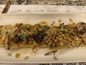 Vegan Polenta Raviolii  at Vine & Olive in Titusville