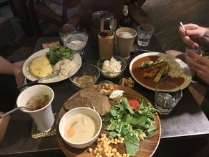 The dish with the soup, bread, salad, beans, and cheese was so good!   at Cafe Sukkara - 수카라 in Seoul