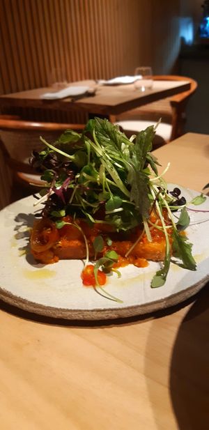 feta, caramelized mixed peppers sauce, house made pain de mie at and/or  in Antwerpen