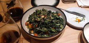 kale salad, roasted pumpkin, almonds, lemon dressing at and/or  in Antwerpen