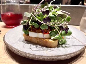 Vegan feta, polenta, spicy saucee  at and/or  in Antwerpen