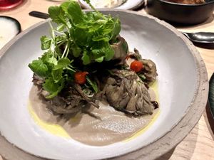 Mushrooms and gravy over polenta. Yum.  at and/or  in Antwerpen