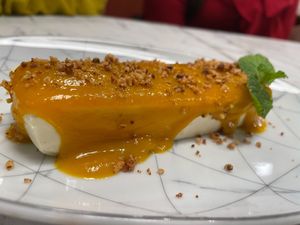 Ice cake with mango toping at Giulietta - Pizzeria & Cucina Vegana in Lisbon