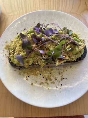 Green toast  at Numa Café - AMUN Cafe in Lisbon