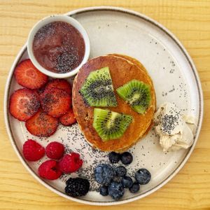 (vegetarian) pancakes with coconut cream. at Numa Café - AMUN Cafe in Lisbon