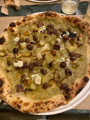 CHECUBO (Vegan)
Patate al forno, Feta veg al rosmarino Veghu, Crema di Carciofo, Olieddas, Olio EVO fruttato medio. at Pizzeria Grains in Cagliari