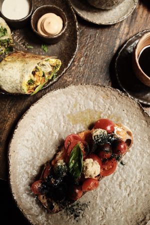 Breakfast burrito on the upper left  at Honest Greens - Fuencarral in Madrid