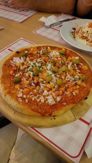 Pizza with Olive, Peper and Onion 🥰 at D' Animas in Havana