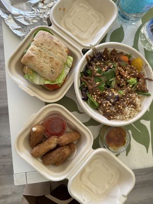 Crispy chicken sandwich (top left), Buddha bowl (top right), mozzarella sticks (bottom left), and crème brûlée (bottom right)  at Earth Aloha Eats in Kihei