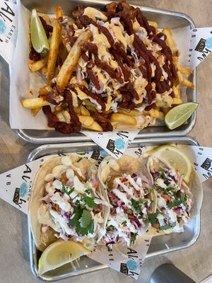 Pulled pork fries and fish tacoss  at Earth Aloha Eats in Kihei