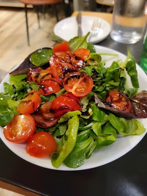 Mixed green salad included arugula, watercress and tomatoes at Fabbrica del Grano - Grani Antichi in Milan