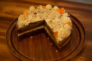 Slice of carrot cake and vanilla cream. at Coraje Vegan in Medellin