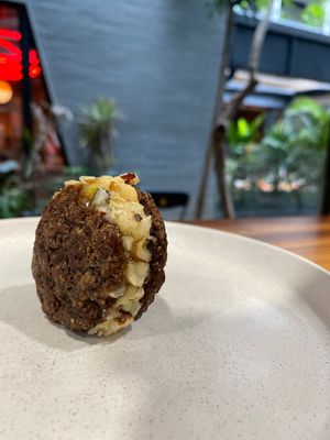 Alfajor 
Chocolate cookie filled with creamy passion fruit ice cream at Coraje Vegan in Medellin