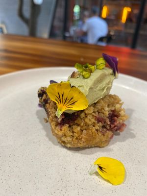 Berries Cramble with avocado ice cram and pistachios at Coraje Vegan in Medellin