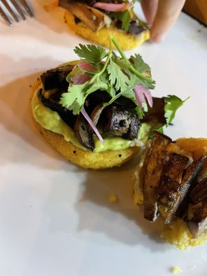 Arepa with green, citrus sauce 1/10 😖  at Coraje Vegan in Medellin