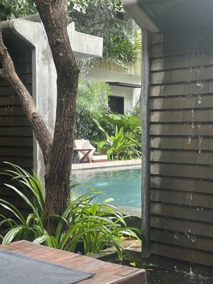 Eating next to a pool  at Jaya House River Park in Siem Reap