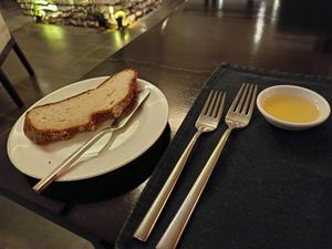 Vegan bread and olive oil at Jaya House River Park in Siem Reap