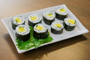 Amber Maki - Classic sushi with pickled radish and shiso leaves and rice rolled up in seaweed. at ARITO - Japanese Vegetarian Fusion in Bangkok