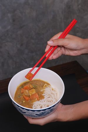 Curry Udon - Rich and creamy Japanese curry loaded with veggies and tofu served with our slurp-worthy udon  at ARITO - Japanese Vegetarian Fusion in Bangkok