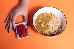 Japanese Brown rice served with thick curry made of carrots, potato, and tofu at ARITO - Japanese Vegetarian Fusion in Bangkok