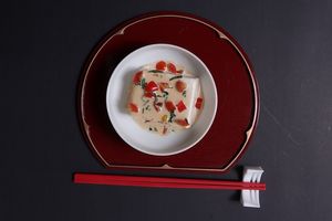 Sesame Tofu - Chilled Silken Tofu with creamy sesame sauce, fresh cherry tomato, and shisho leaves. at ARITO - Japanese Vegetarian Fusion in Bangkok