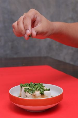 Neera Tofu - Chilled Silken Tofu with umami soya sauce garnished with garlic chives at ARITO - Japanese Vegetarian Fusion in Bangkok