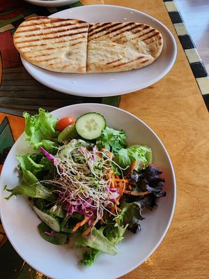 Salad with wonderful dressing and vegan naan at Scallions in Saratoga Springs