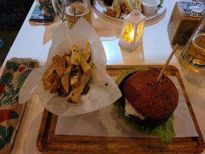 Vegan Burger with excellent fries! Try the "Algo Picante" sauce!! at The Open Kitchen - La Fortuna in La Fortuna