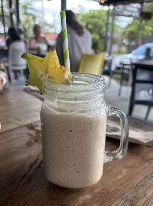 Coco Date Shake (w😋w)   This place has one of the best tropical shakes and juices.  Good vegan and vegetarian options. Descent food taste.  at The Open Kitchen - La Fortuna in La Fortuna