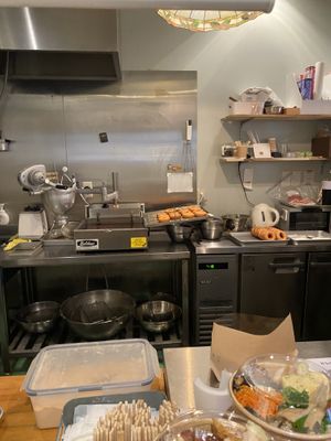 kitchen is also cashier   at Cohachi - 米粉と豆腐のどーなつ in Osaka