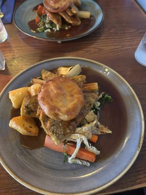 Vegan turkey and stuffing roast with a Yorkshire pudding, roast potatoes and veg, plenty of gravy and all super tasty. at The Commodore Inn in Grange-over-sands