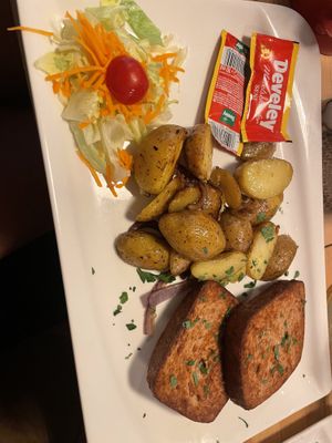Vegan meatloaf with fried potatoes   at Brauhaus Tünnes und Schäl in Cologne