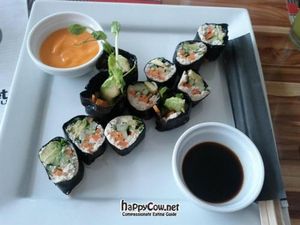 Sushi vegan raw - Almond and sunflower seed's pate, and avocado, wrapped in nori. at Vegan Planet in Cancun