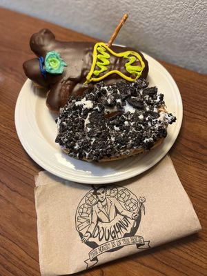 Vegan Voodoo raspberry filled. And Dirt doughnut with Oreo topping. DELICIOUS   at Voodoo Doughnuts in San Antonio