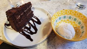Vegan fudge cake and vanilla ice cream at Delhiwala Food in Leeds