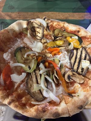 Vegetable pizza with vegan cheese  at Pizzeria Mezzaluna in Lanzarote