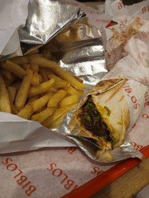 Regular falafel wrap & chips at Biblos in Bristol