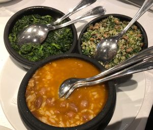 Rice with beans (“malandrinho”), “migas” (black eyed peas, cabbage and corn bread), sautéed vegetables   at Restaurante 3 Pipos in Tondela