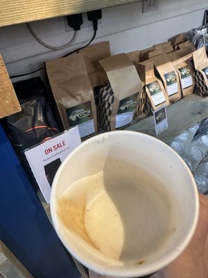 Very glamorous photo of an oat macchiato…… 😉  at Doppio Coffee Warehouse Kentish Town in North West London
