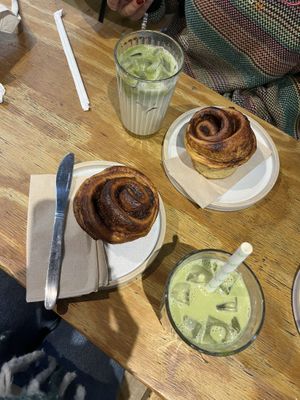 iced vanilla matcha latte with oat milk & cinnamon bun  at Doppio Coffee Warehouse Kentish Town in North West London