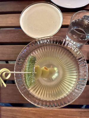 dirty vodka martini with large queen olives and a cornichon   at Poco Fiasco  in Dallas
