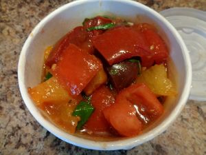 Heirloom Tomato Salad. Locally-grown heirloom tomatoes, basil, red onion slivers, balsamic.  at Rabbit Food in Painesville