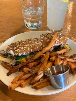 Oyster mushrooms cheesesteak sandwich and fries. Top of the tops for brunch! at Sweet Grass Grill in Tarrytown