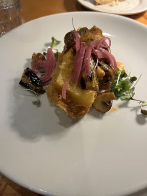 Polenta cake (on the daily specials menu)  at Sweet Grass Grill in Tarrytown