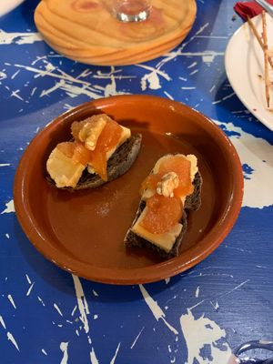 Mini tostadas con queso, membrillo y nuez. El queso lo elaboran en el local,  muy rico! at Utopía in A Coruna