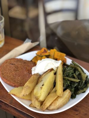Burger and fresh veggies   at ZEM Bistro in Bologna